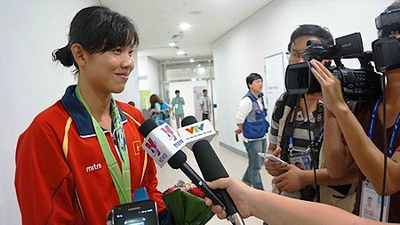 Nguyễn Thị Ánh Viên và Võ Thanh Tùng được bầu vận động viên xuất sắc nhất năm 2014