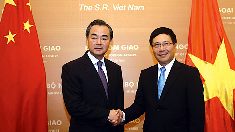 Phó Thủ tướng, Bộ trưởng Bộ Ngoại giao Phạm Bình Minh và Bộ trưởng Bộ Ngoại giao Trung Quốc Vương Nghị. Ảnh: Thống Nhất - TTXVN