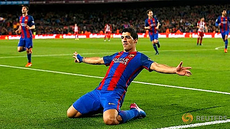 Tiền đạo Luis Suarez ăn mừng bàn thắng vào lưới Atletico. Ảnh: Reuters