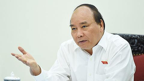 Thủ tướng Chính phủ Nguyễn Xuân Phúc chỉ đạo tại cuộc họp. Ảnh: VGP/Quang Hiếu 