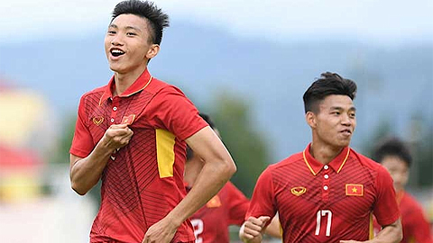 Niềm vui của các cầu thủ U22 Việt Nam sau bàn mở tỷ số của cầu thủ Đoàn Văn Hậu (bên trái).