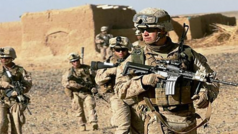 Binh sĩ Mỹ trong một chiến dịch truy quét phiến quân Ta-li-ban ở Áp-ga-ni-xtan. Ảnh ANA