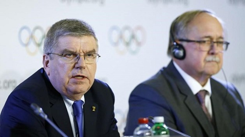 Ông Samuel Schmid tại buổi họp báo của IOC. 