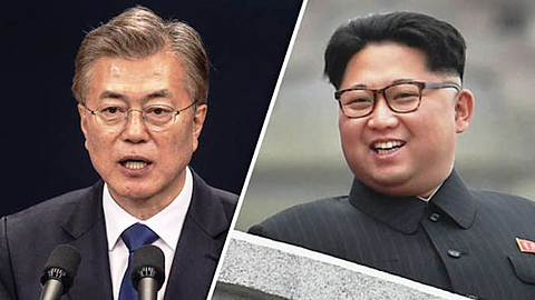 Tổng thống Hàn Quốc Mun Chê-in (trái) và nhà lãnh đạo Triều Tiên Kim Dâng-un. Ảnh: Getty