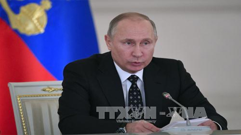 Tổng thống Nga Vladimir Putin đã vượt qua vòng tranh cử thứ nhất. Ảnh: AFP/TTXVN