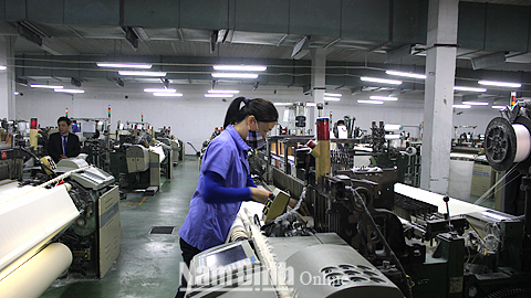 Sản xuất vải, sợi tại Tổng Cty CP Dệt may Nam Định.