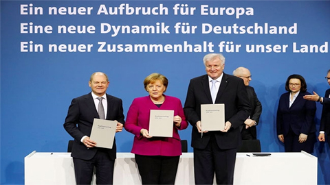 Lễ ký thỏa thuận thành lập chính phủ liên minh tại Đức. Ảnh: Reuters