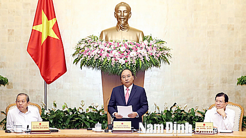 Thủ tướng Nguyễn Xuân Phúc phát biểu tại phiên họp. Ảnh: Thống Nhất - TTXVN