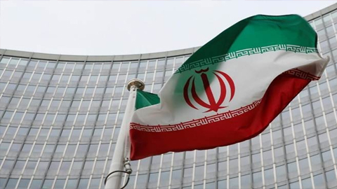 Cờ của Iran trước trụ sở Cơ quan năng lượng nguyên tử quốc tế (IAEA) tại Áo. (Ảnh: Reuters)
