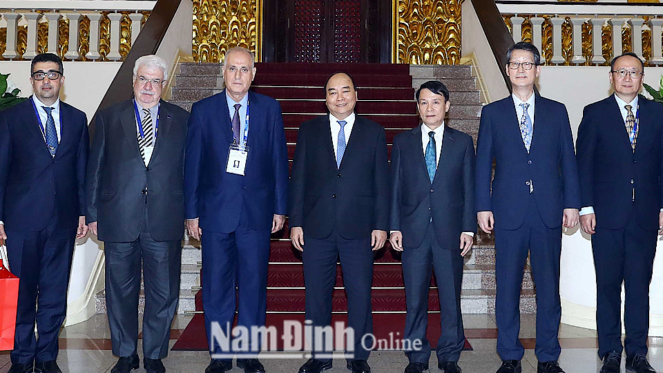 Thủ tướng Nguyễn Xuân Phúc và các Trưởng đoàn tại buổi tiếp. Ảnh: Thống Nhất - TTXVN