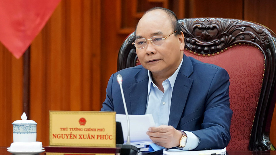 Thủ tướng Nguyễn Xuân Phúc phát biểu tại cuộc họp.  Ảnh: VGP/Quang Hiếu
