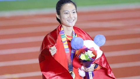 Lê Tú Chinh xuất sắc bảo vệ thành công tấm HCV nội dung chạy 100m nữ. 