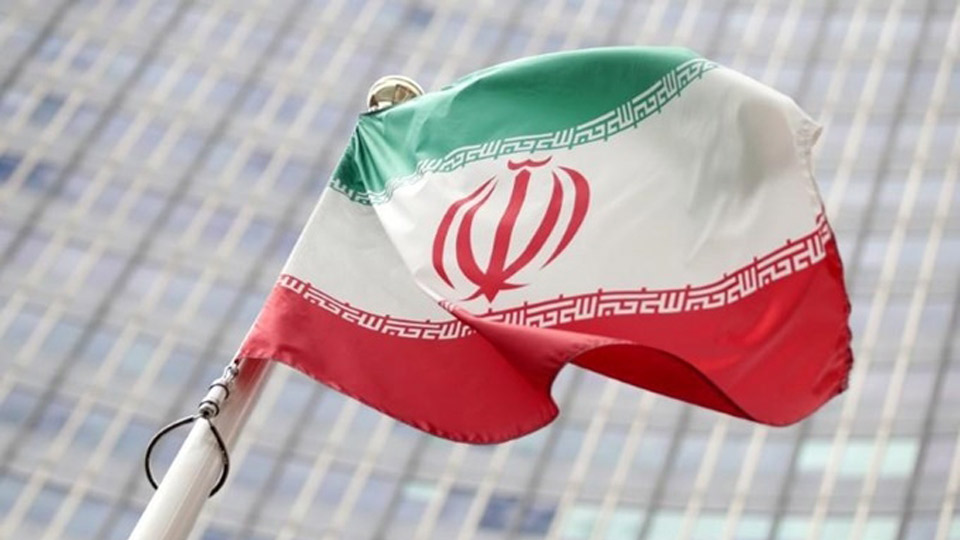 Cờ của Iran trước trụ sở Cơ quan Năng lượng nguyên tử quốc tế (IAEA) tại Vienna, Áo, tháng 7-2019.  Ảnh: Reuters