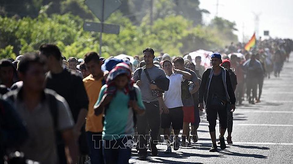 Người di cư di chuyển từ Ciudad Hidalgo tới Tapachula, bang Chiapas (Mexico) trong hành trình tới Mỹ ngày 23/1/2020. Ảnh tư liệu: AFP/TTXVN