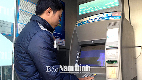 Bảo đảm đáp ứng nhu cầu sử dụng tiền mặt và các giao dịch qua ngân hàng của nhân dân