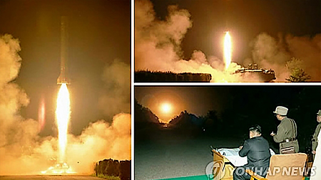 Nhà lãnh đạo Triều Tiên Kim Jong Un chỉ đạo diễn tập phóng tên lửa. Ảnh KCNA công bố hôm 10-7-2014 (ảnh: Yonhap)