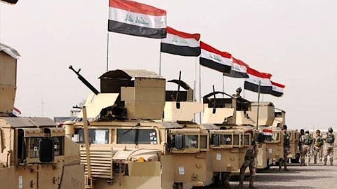 Các lực lượng an ninh Iraq lái chuẩn bị tới TP Mosul để tấn công IS, ngày 21-2. (Ảnh: Reuters)