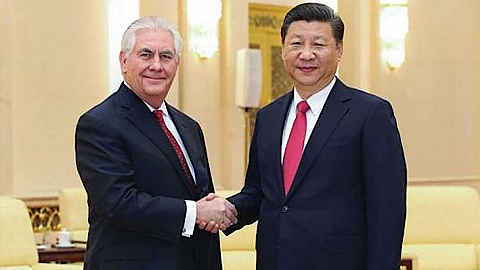 Ngoại trưởng Mỹ Rex Tillerson và Chủ tịch Trung Quốc Tập Cận Bình. Ảnh: AFP