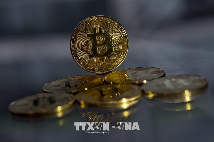 Iran đã cấm các ngân hàng và các tổ chức tín dụng cho phép giao dịch bằng tiền điện tử, bao gồm cả đồng Bitcoin. Ảnh: AFP/TTXVN 