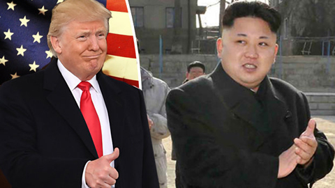 Tổng thống Mỹ Đô-nan Trăm và nhà lãnh đạo Triều Tiên Kim Dâng-un.  Ảnh: TTXVN