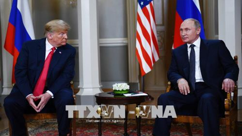 Tổng thống Nga Vladimir Putin (phải) và Tổng thống Mỹ Donald Trump tại cuộc gặp thượng đỉnh ở Helsinki, Phần Lan ngày 16/7. Ảnh: AFP/TTXVN 