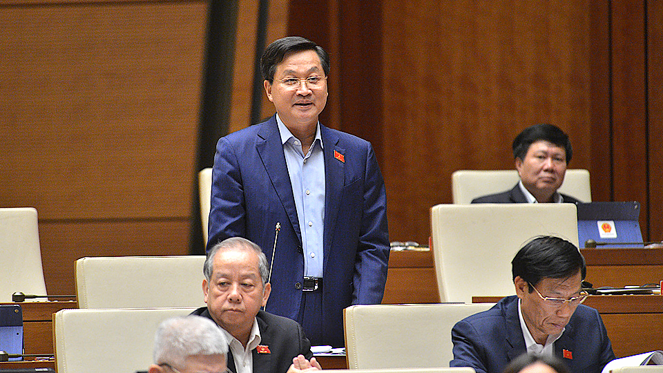 Tổng Thanh tra Chính phủ Lê Minh Khái trả lời chất vấn của các đại biểu Quốc hội. Ảnh: quochoi.vn