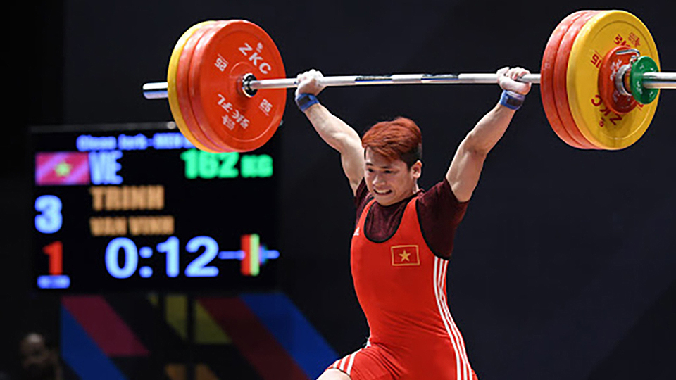VĐV Trịnh Văn Vinh từng vô địch cử tạ thế giới hạng cân 62 kg bị cấm thi đấu bốn năm do sử dụng đô-pinh. Ảnh:TIẾN TUẤN